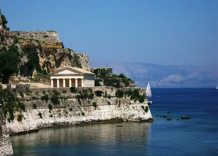 Panoramic view of Corfu coastline with sailboats