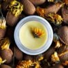 Kear Life Herbal Superstars Face Balm - Open jar with creamy white-yellow texture and flowers