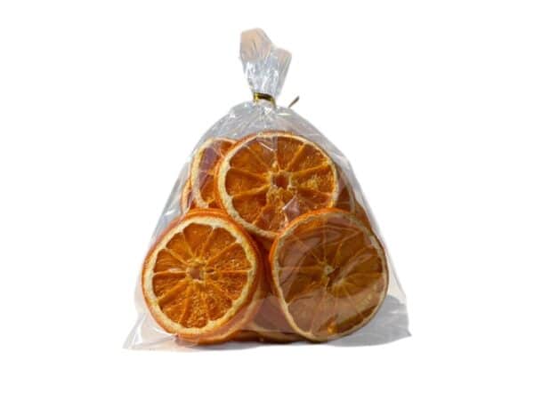 Oranges séchées de Crète. Oranges séchées de Crète en rondelles dans un sachet artisanal transparent