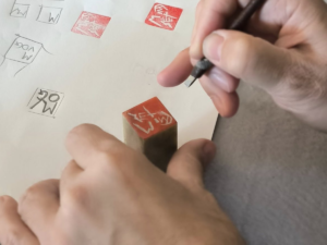 Hand-engraving of a traditional seal during a creative workshop in Athens