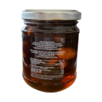 Dos du bocal d’olives Kalamata confites sucrées avec ingrédients, amandes et valeurs nutritionnelles – spécialité grecque 220 g.