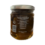 Bocal d’olives vertes confites sucrées montrant les informations de conservation, l’origine grecque et le poids net 220 g.